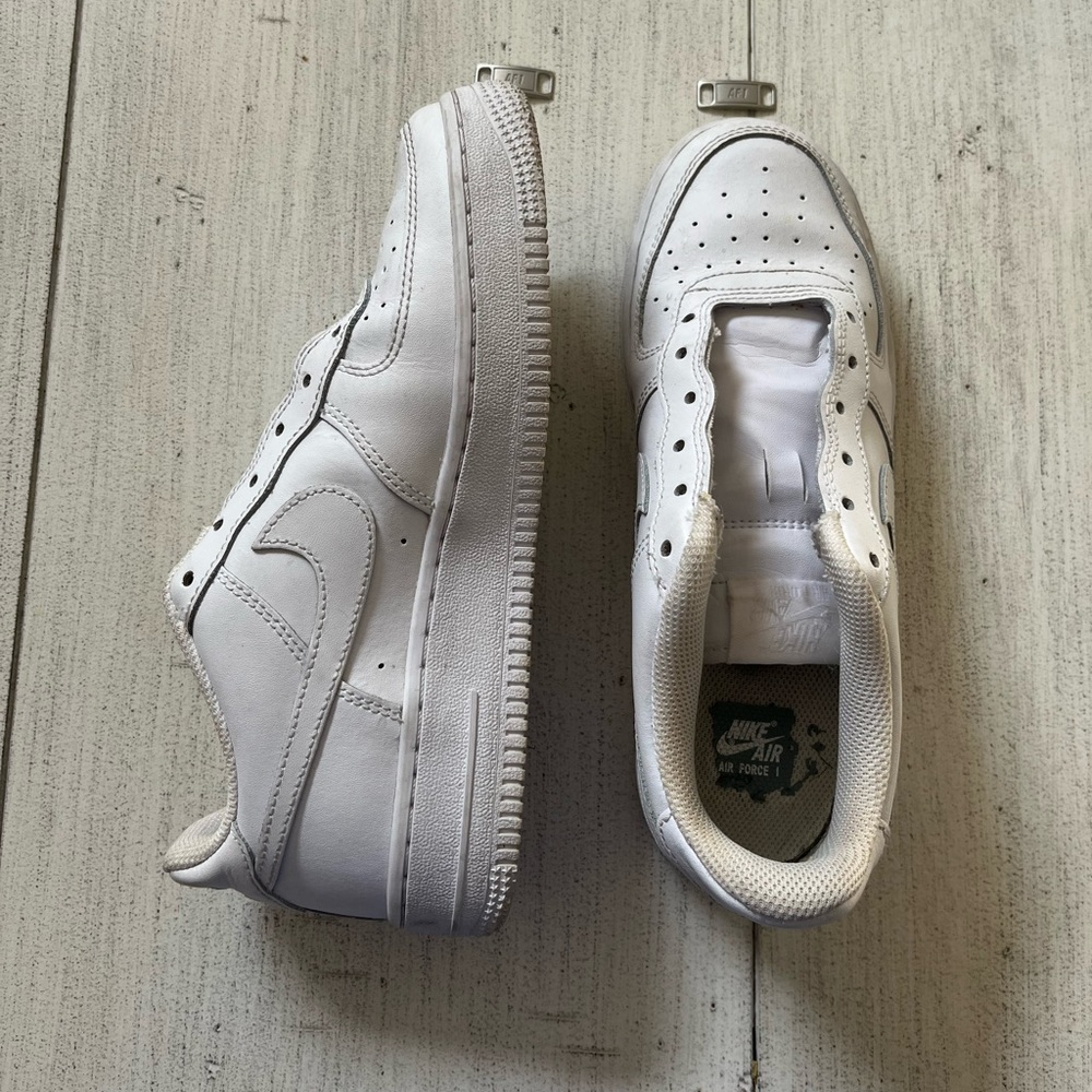 Nike air forces, size 5 in men (6.5 in women)